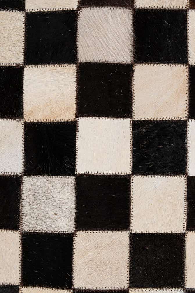 4' 11 x 8' 1 Cowhide - Patchwork Rug