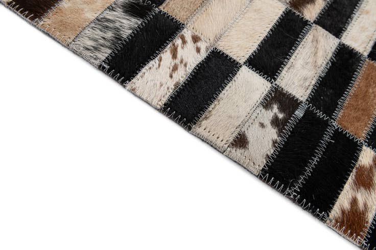Detail image of 5' 3 x 8' Cowhide - Patchwork Rug