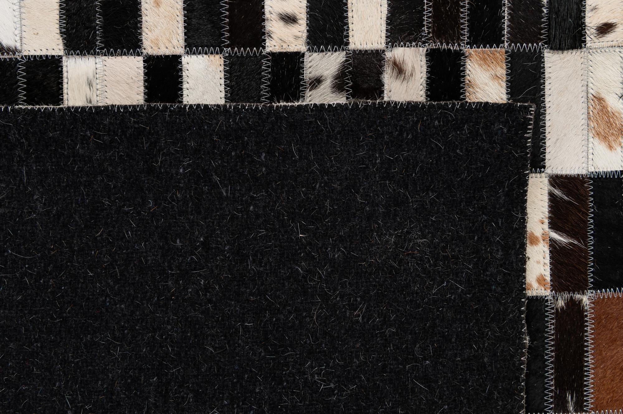 5' 3 x 8' Cowhide - Patchwork Rug