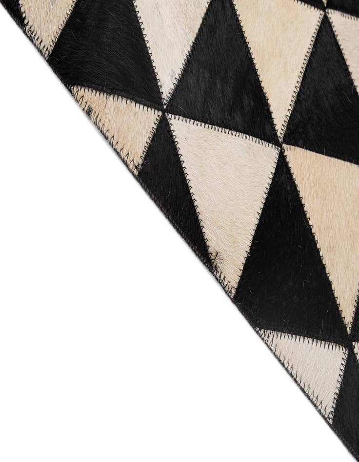 Detail image of 5' 2 x 8' 2 Cowhide - Patchwork Rug