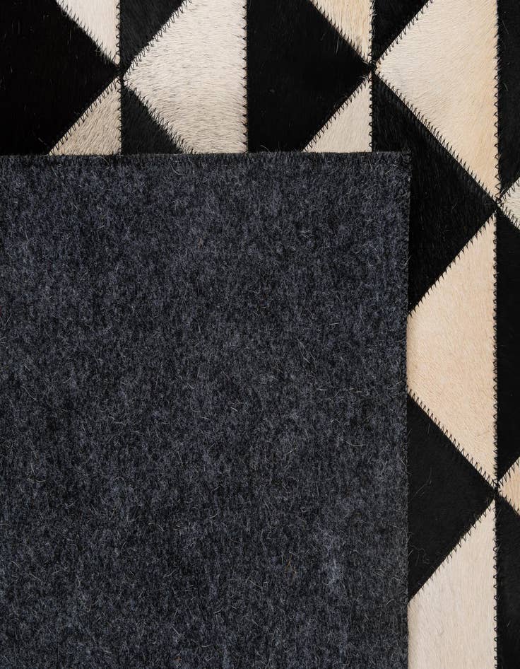 Detail image of 5' 2 x 8' 2 Cowhide - Patchwork Rug