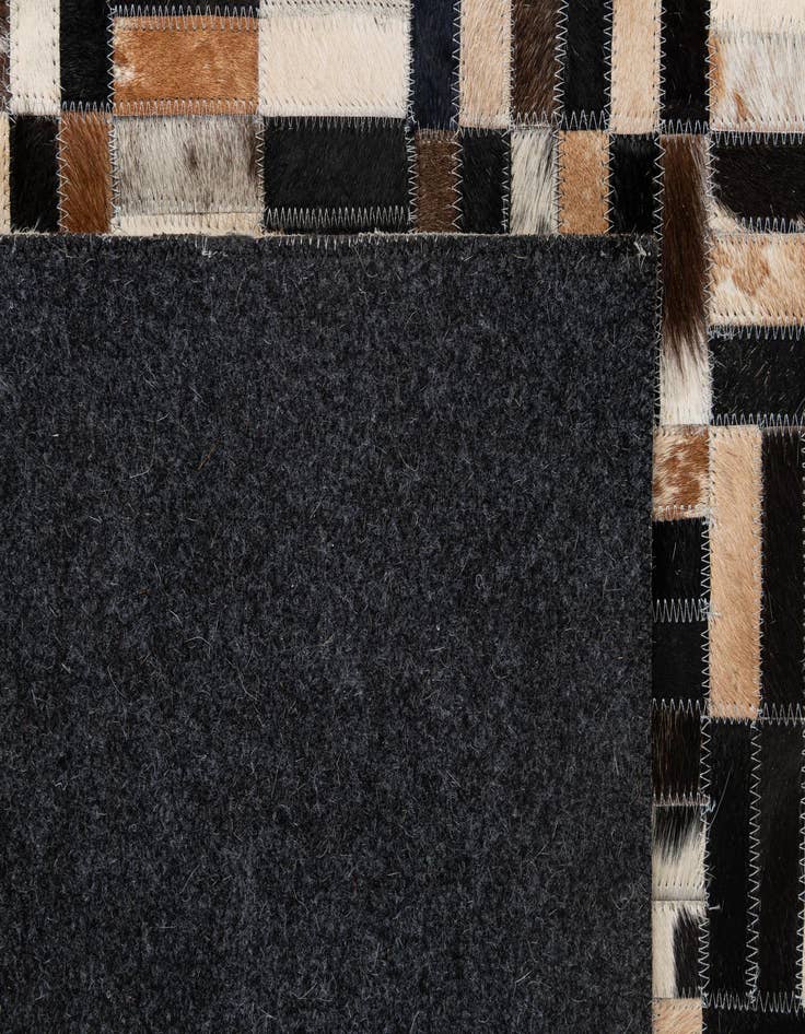 Detail image of 5' 1 x 8' Cowhide - Patchwork Rug