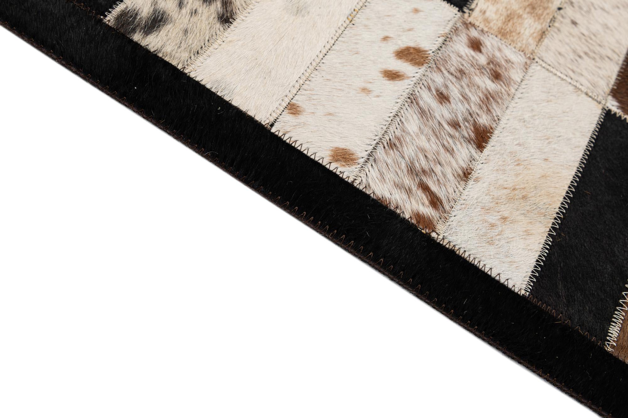 5' 1 x 7' 11 Cowhide - Patchwork Rug