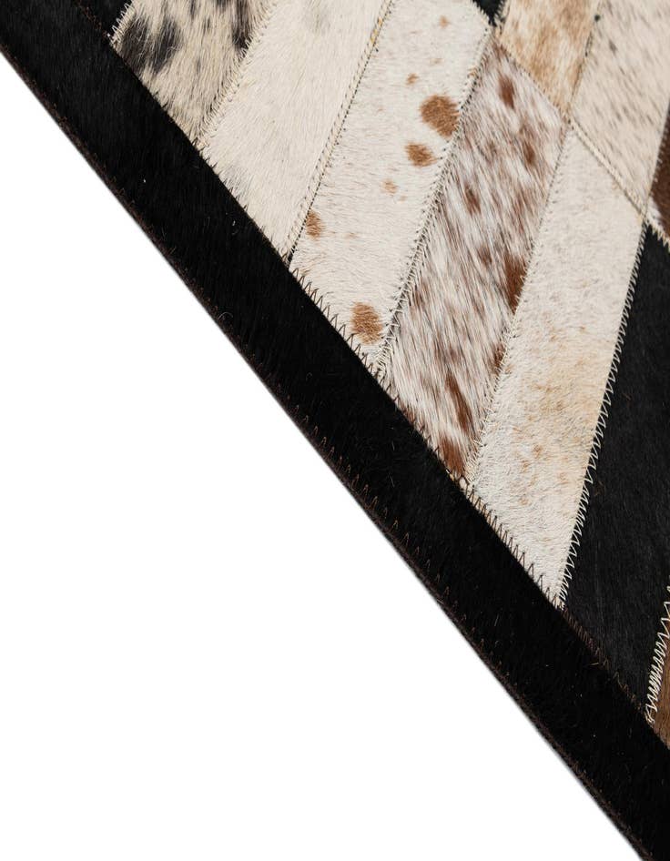 Detail image of 5' 1 x 7' 11 Cowhide - Patchwork Rug