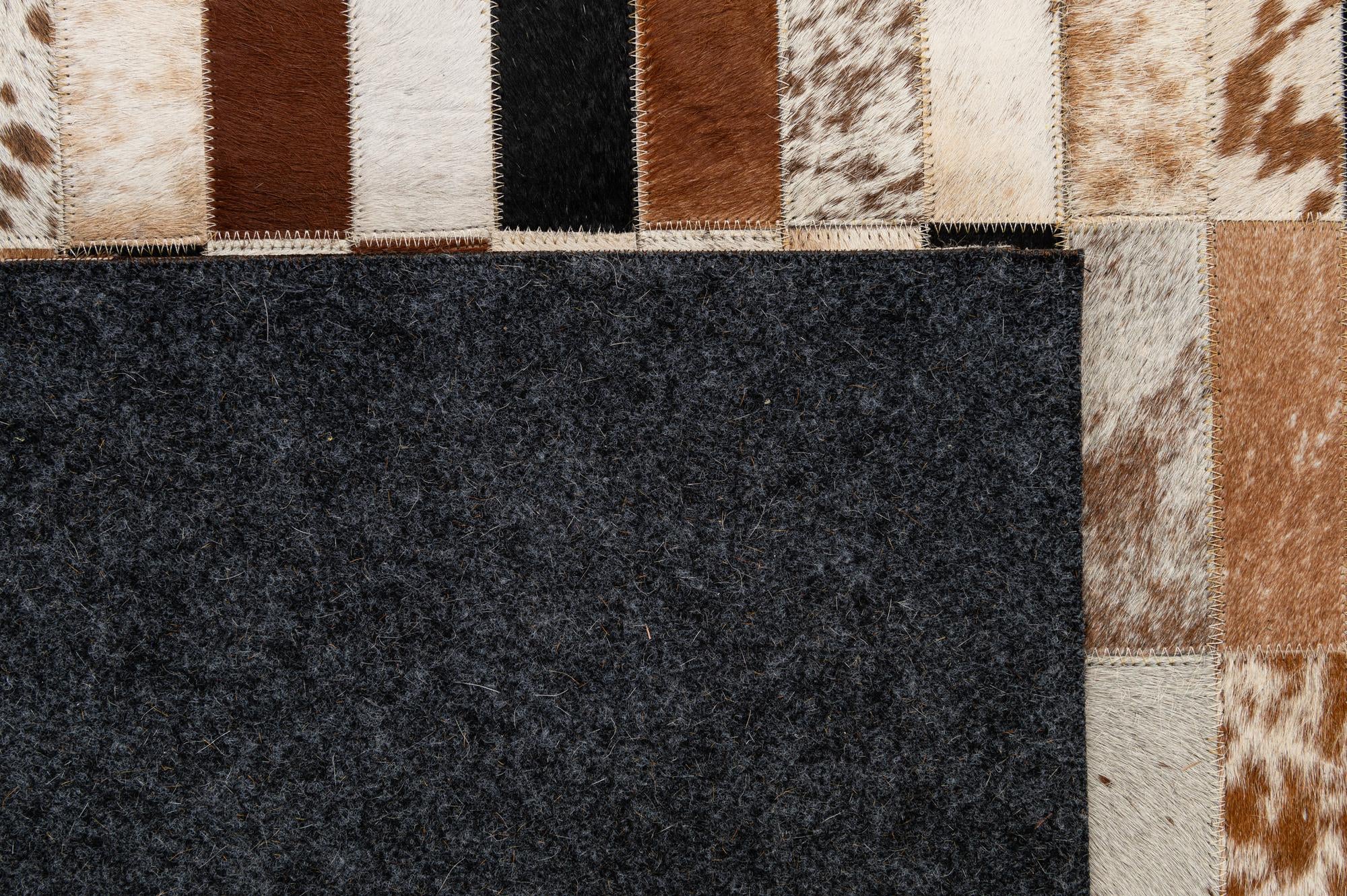 5' 1 x 7' 11 Cowhide - Patchwork Rug