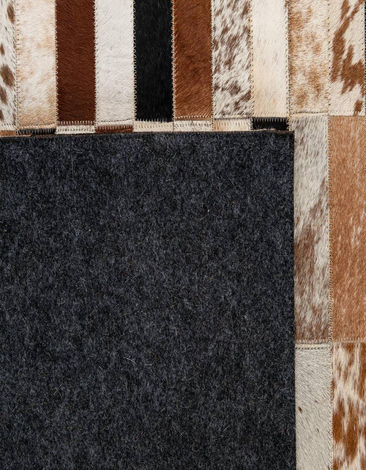 Detail image of 5' 1 x 7' 11 Cowhide - Patchwork Rug