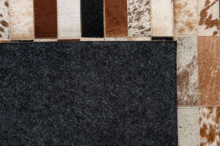 5' 1 x 7' 11 Cowhide - Patchwork Rug