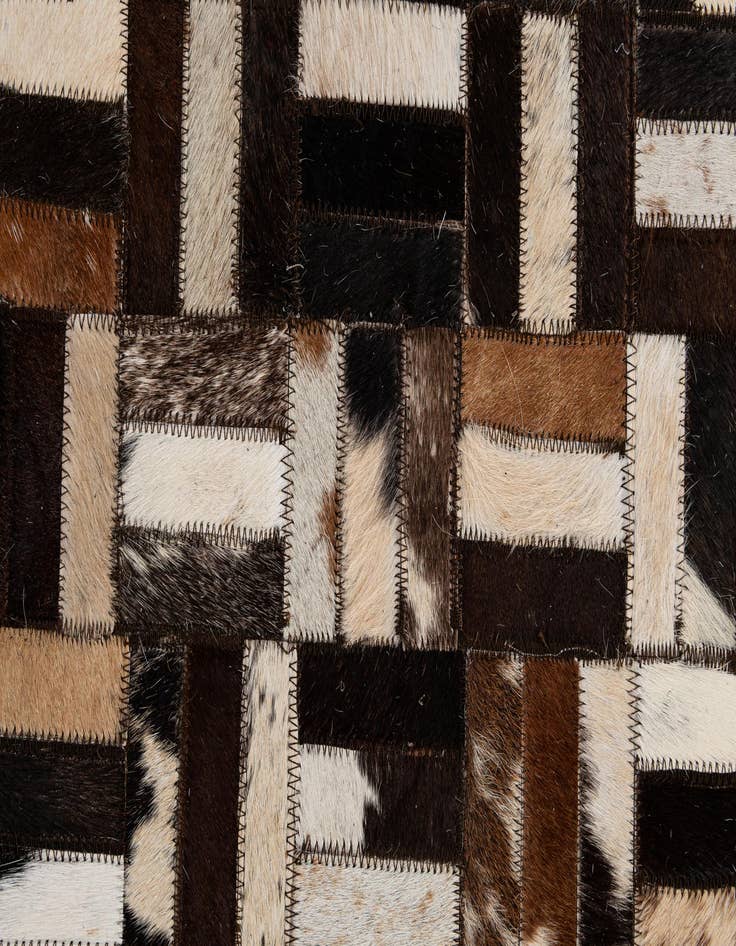 Detail image of 4' 11 x 7' 10 Cowhide - Patchwork Rug