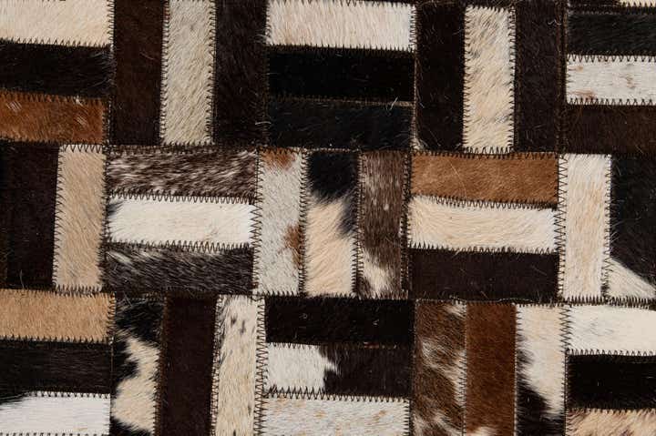 4' 11 x 7' 10 Cowhide - Patchwork Rug