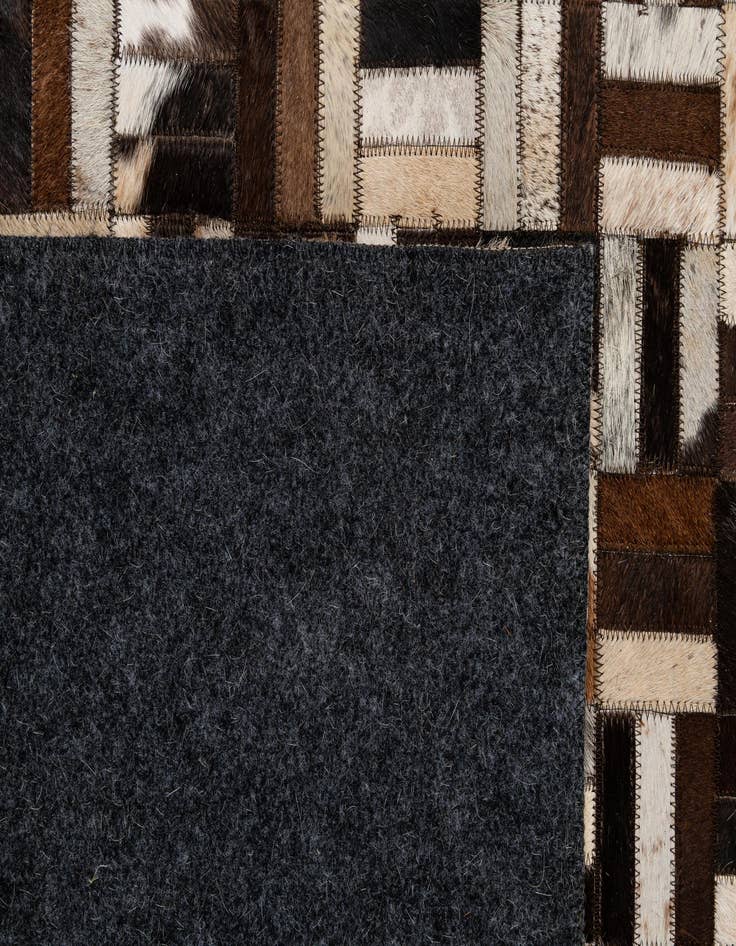 Detail image of 4' 11 x 7' 10 Cowhide - Patchwork Rug
