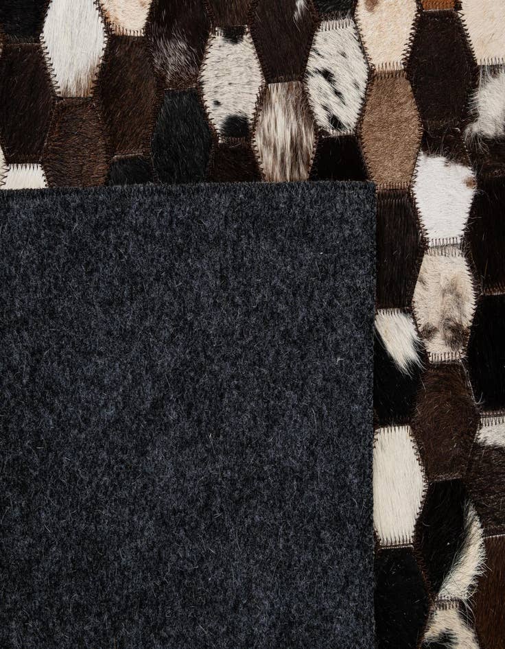 Detail image of 5' 1 x 8' Cowhide - Patchwork Rug