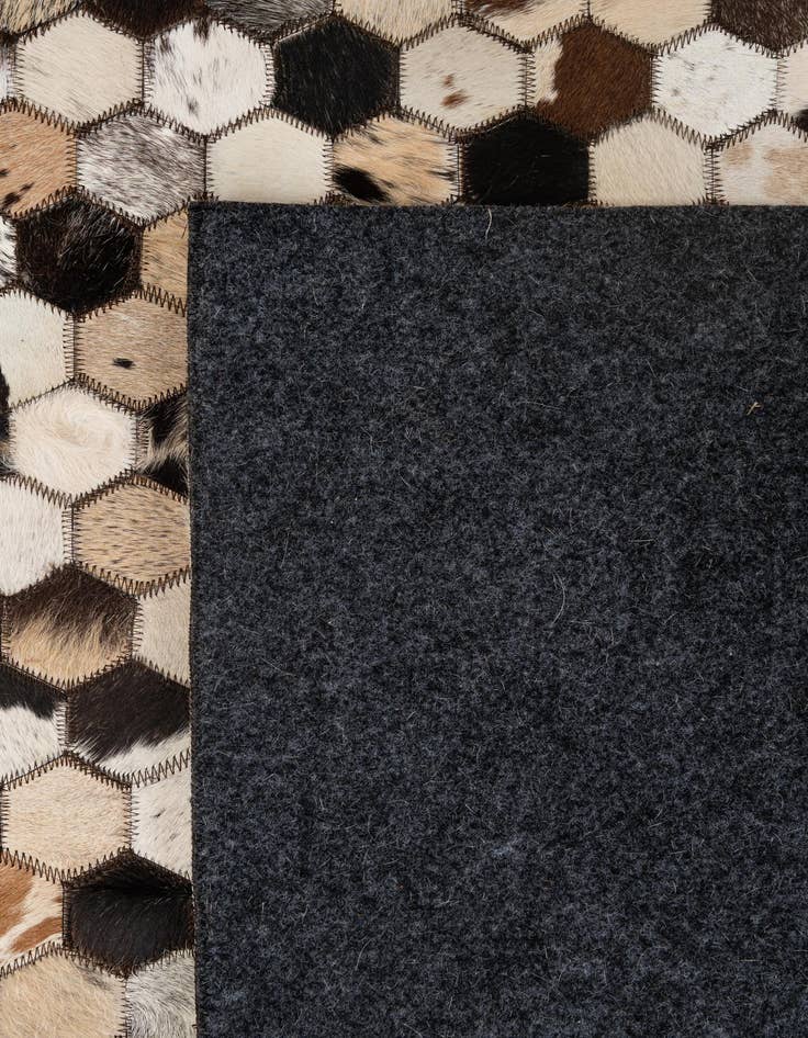 Detail image of 5' 1 x 7' 11 Cowhide - Patchwork Rug
