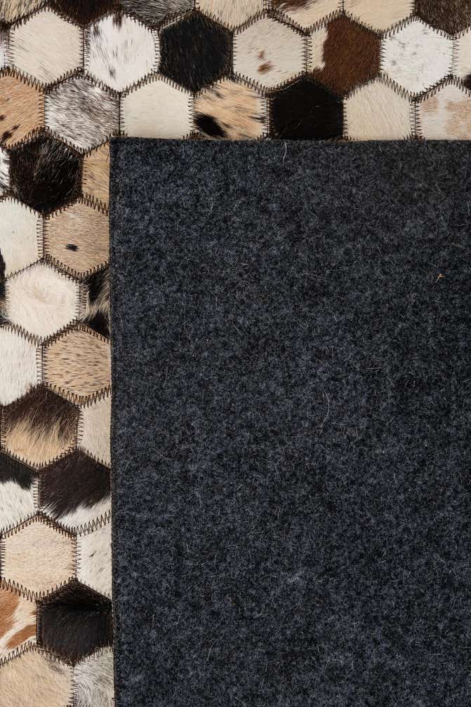 5' 1 x 7' 11 Cowhide - Patchwork Rug