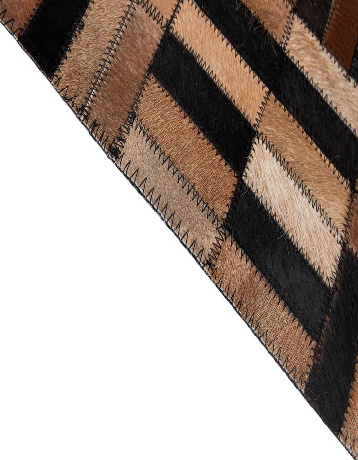 Detail image of 5' x 7' 11 Cowhide - Patchwork Rug