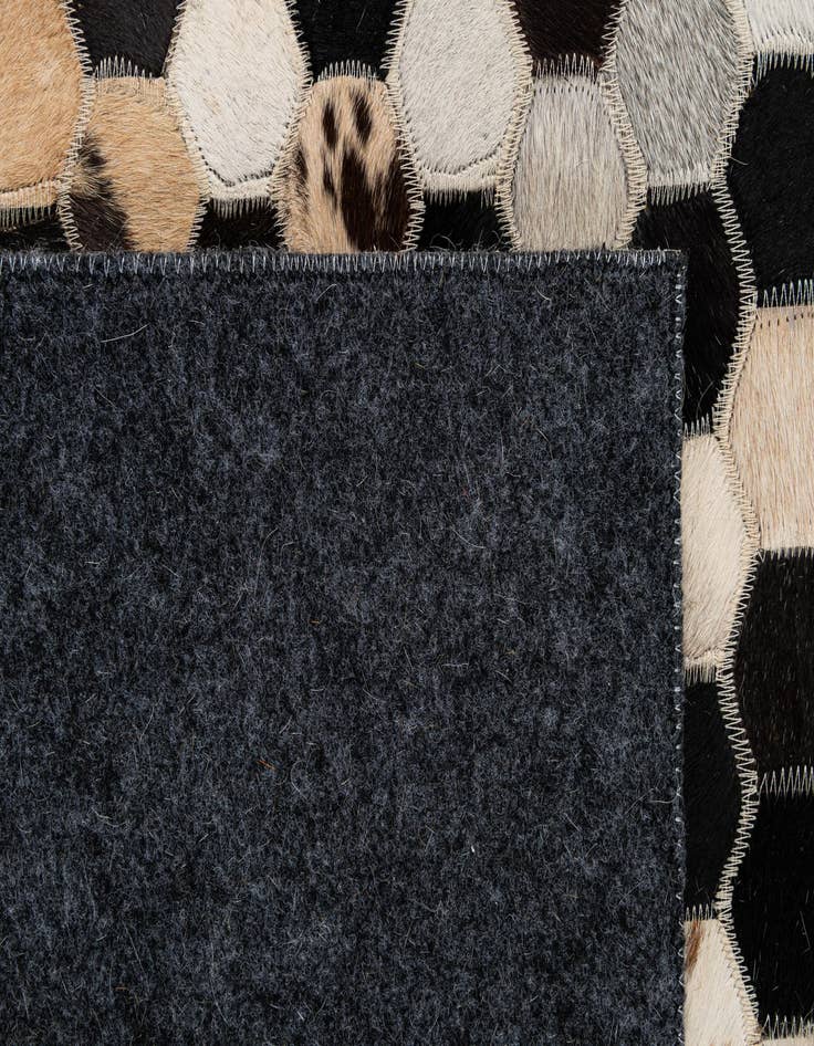 Detail image of 5' x 7' 11 Cowhide - Patchwork Rug