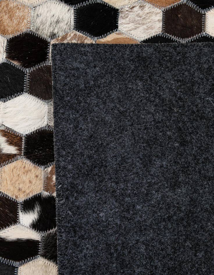 Detail image of 5' 1 x 8' Cowhide - Patchwork Rug