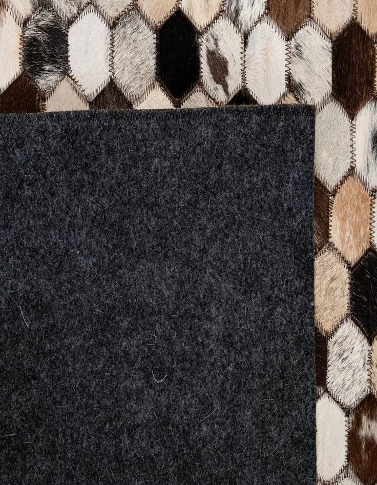 Detail image of 5' 1 x 7' 11 Cowhide - Patchwork Rug