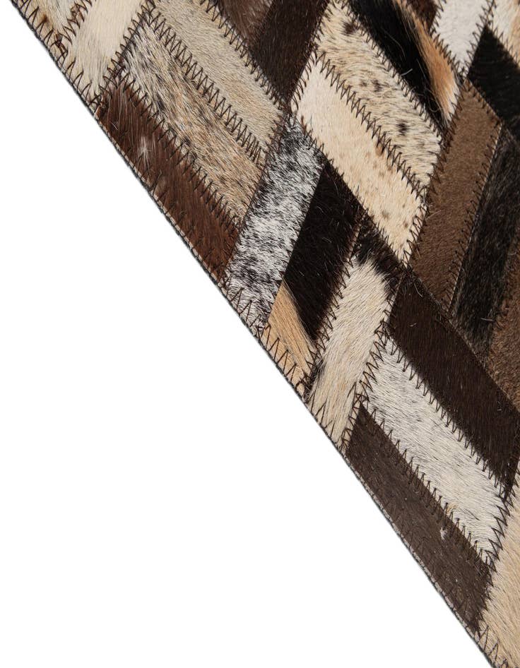 Detail image of 5' 2 x 8' 1 Cowhide - Patchwork Rug