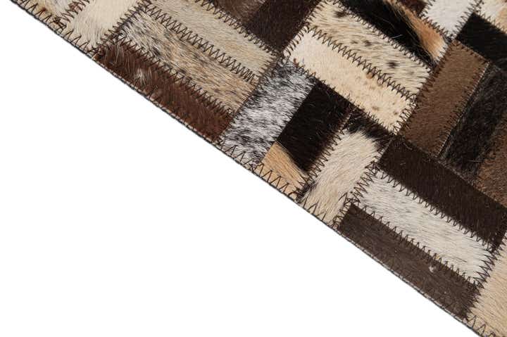5' 2 x 8' 1 Cowhide - Patchwork Rug
