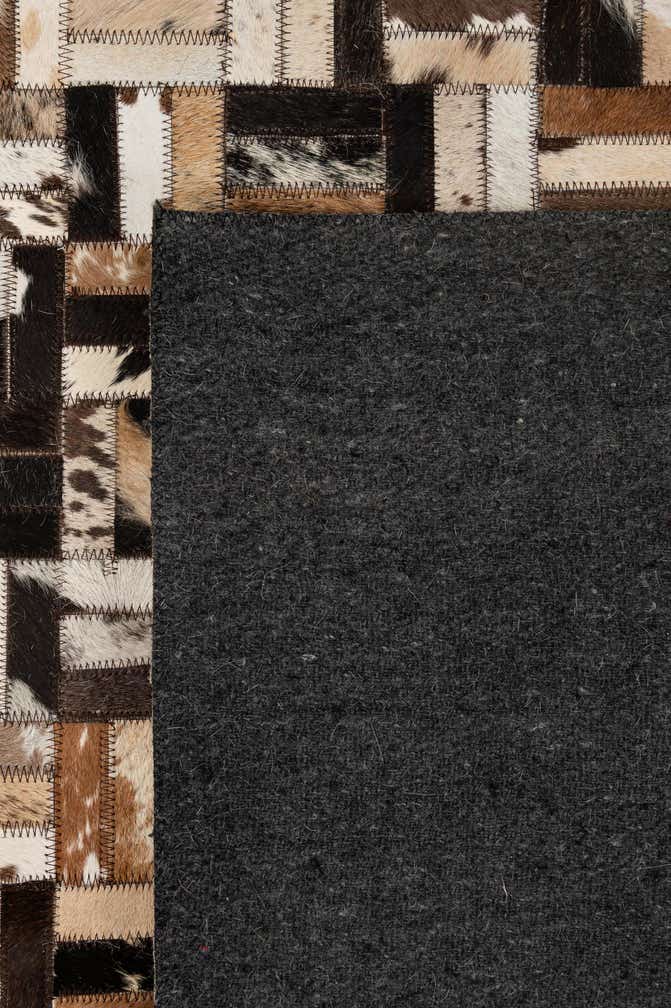 5' 2 x 8' 1 Cowhide - Patchwork Rug