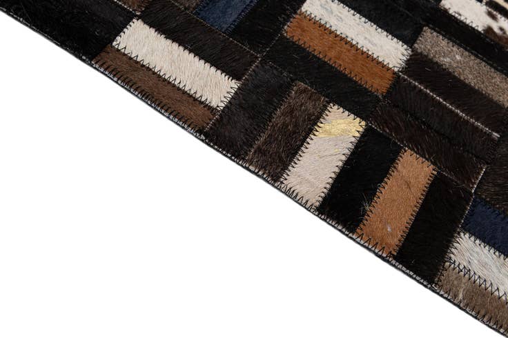 Detail image of 5' 1 x 8' Cowhide - Patchwork Rug