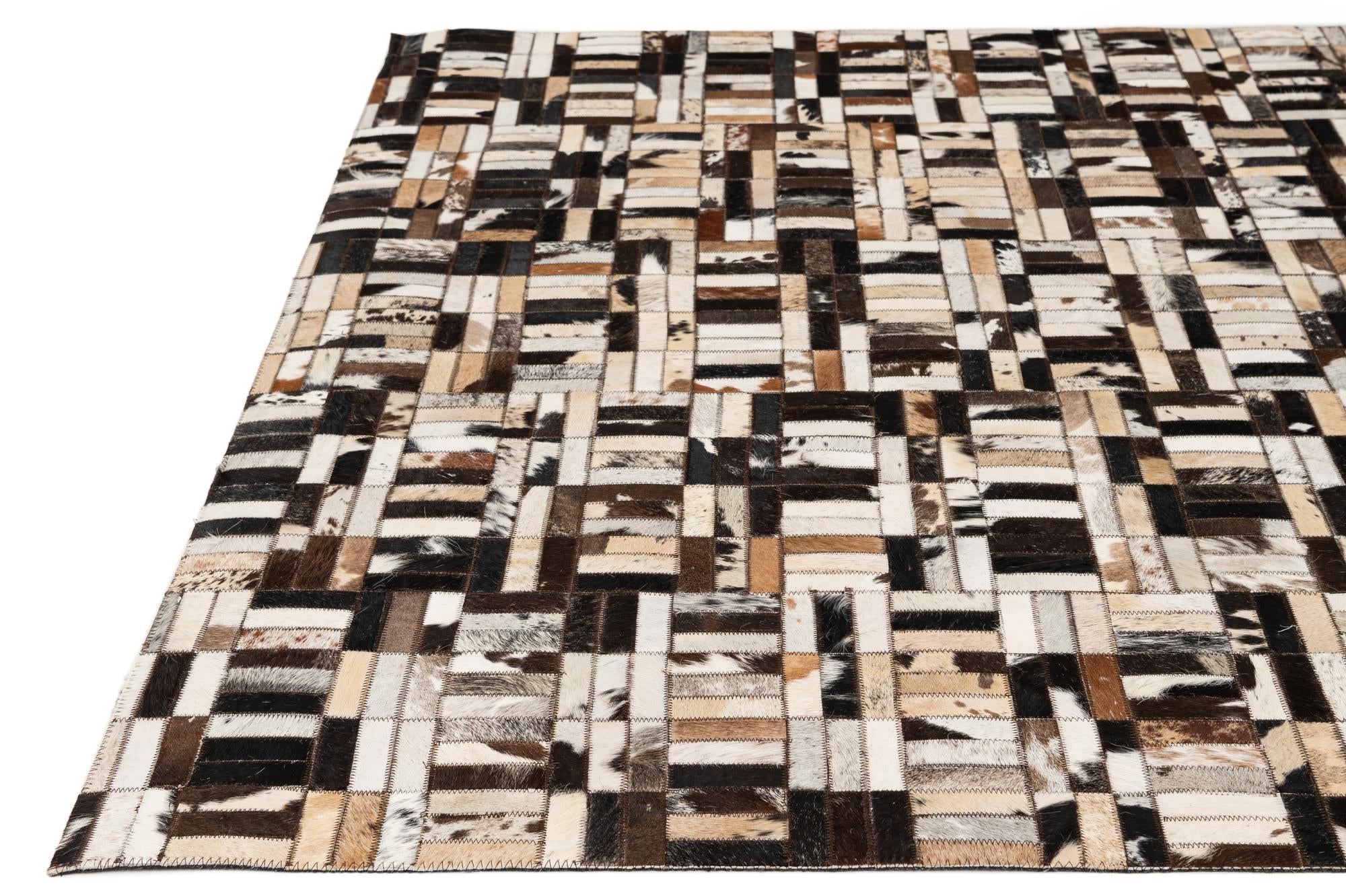 4' 11 x 7' 10 Cowhide - Patchwork Rug