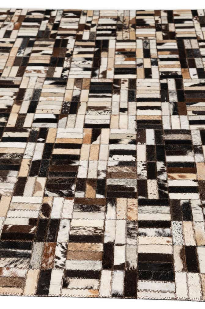 4' 11 x 7' 10 Cowhide - Patchwork Rug