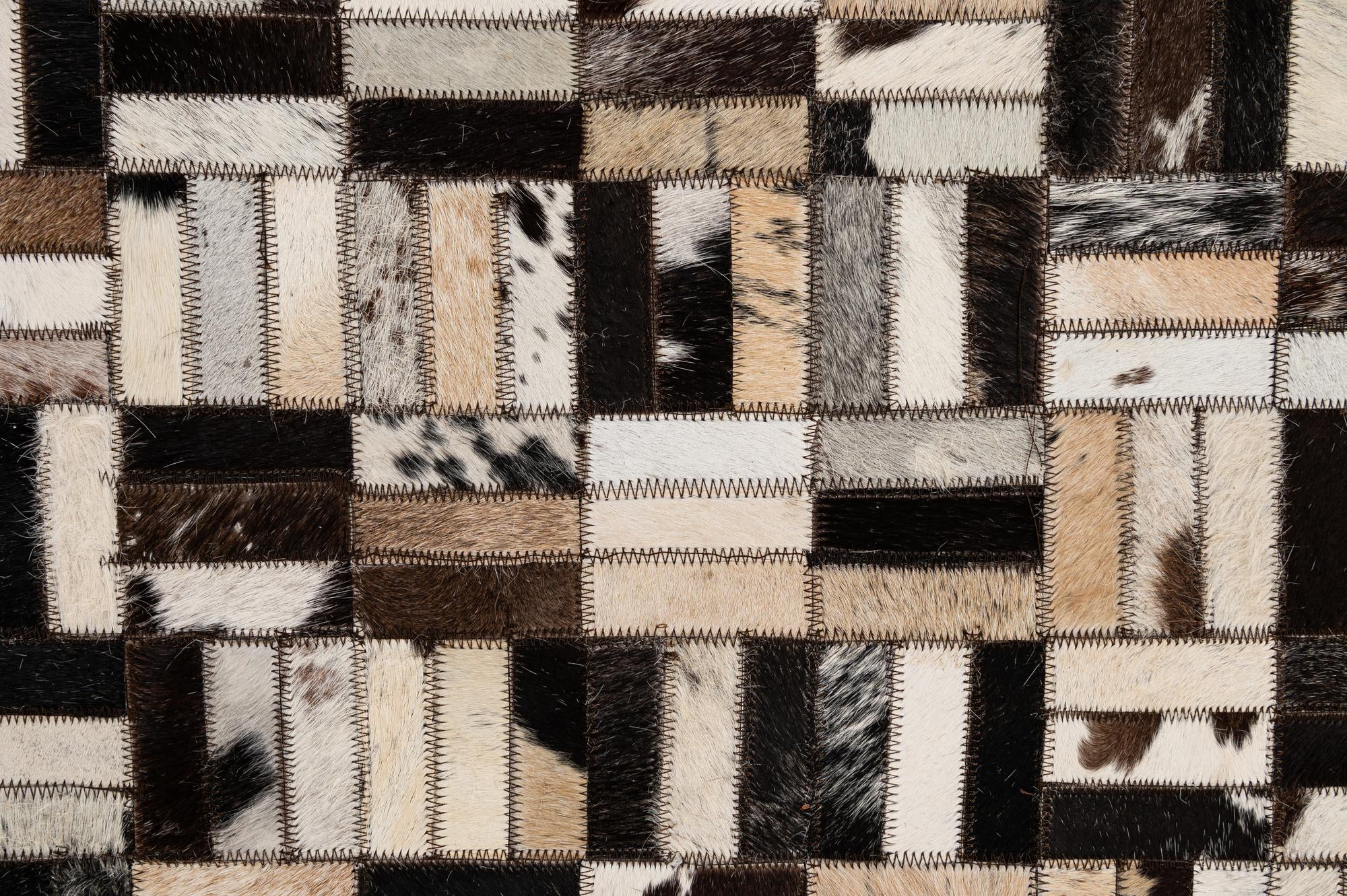 4' 11 x 7' 10 Cowhide - Patchwork Rug