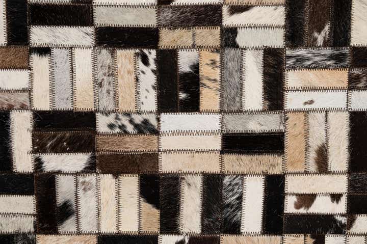 4' 11 x 7' 10 Cowhide - Patchwork Rug