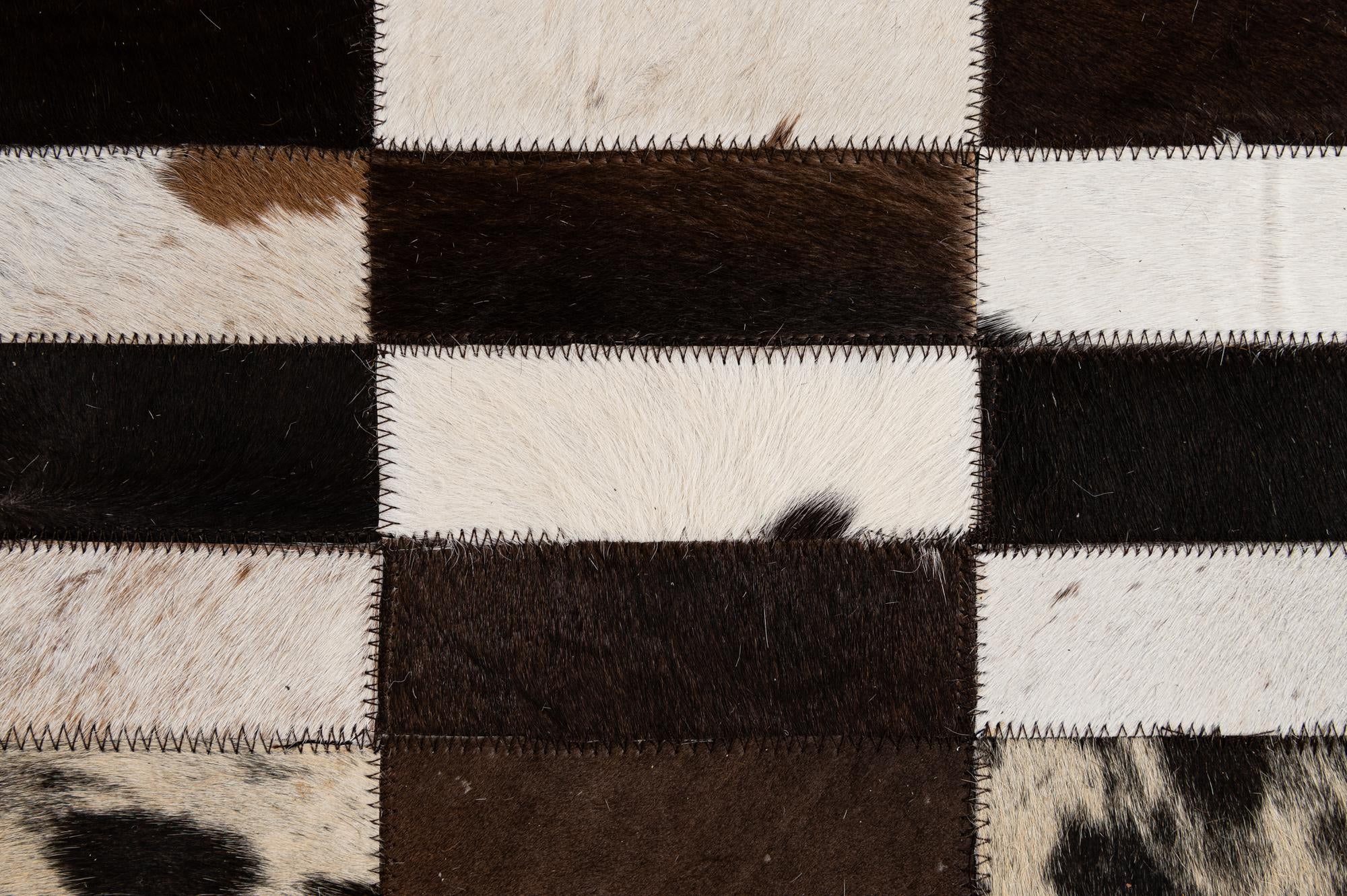 4' 11 x 8' Cowhide - Patchwork Rug