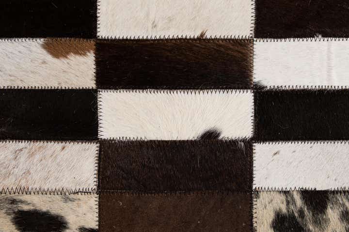 4' 11 x 8' Cowhide - Patchwork Rug