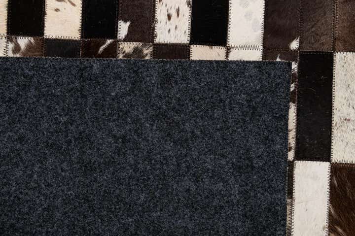 4' 11 x 8' Cowhide - Patchwork Rug