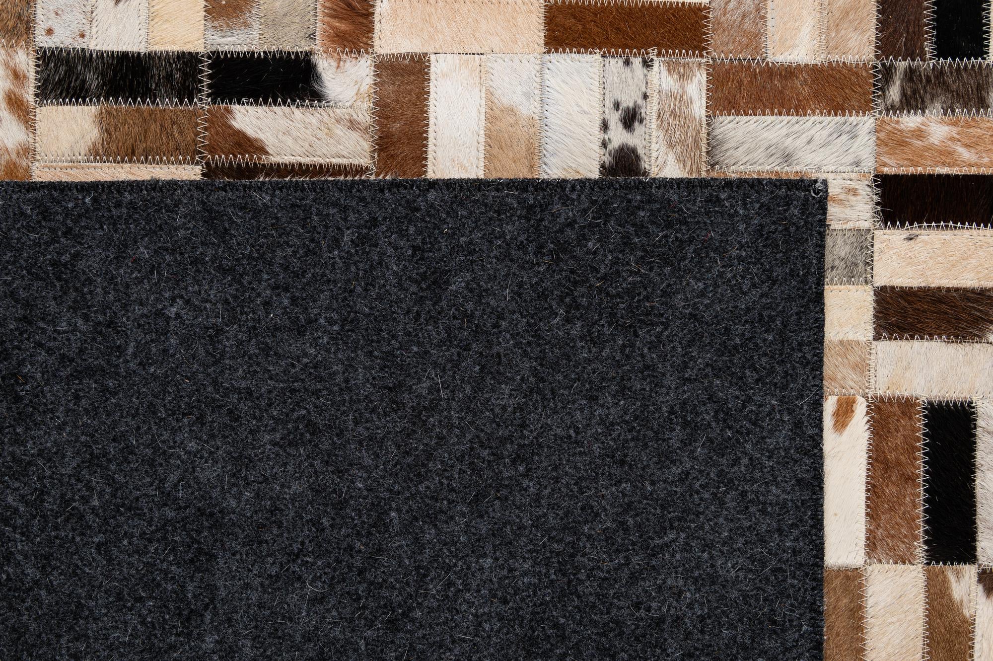 5' 1 x 8' Cowhide - Patchwork Rug