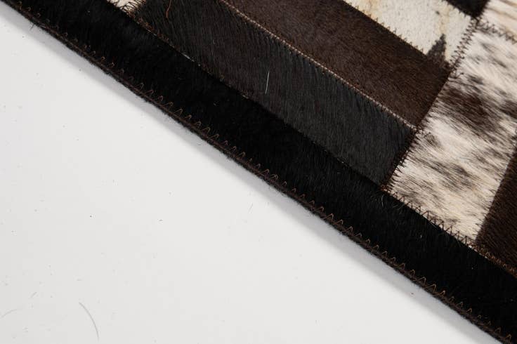 Detail image of 5' 1 x 7' 11 Cowhide - Patchwork Rug