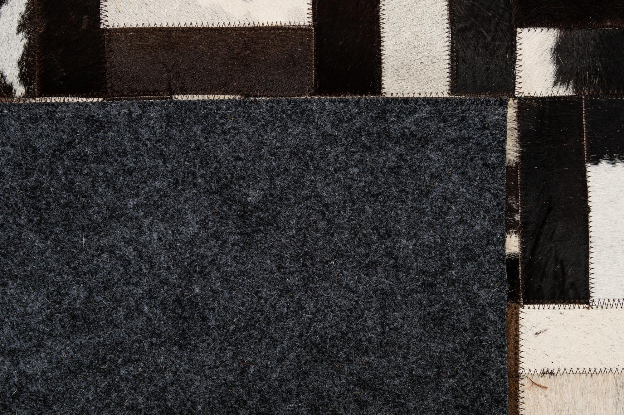 5' 1 x 7' 11 Cowhide - Patchwork Rug