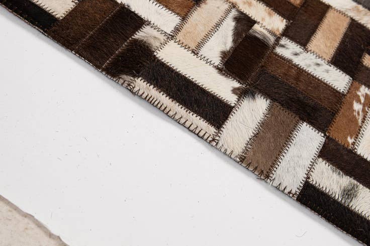 Detail image of 4' 11 x 7' 11 Cowhide - Patchwork Rug