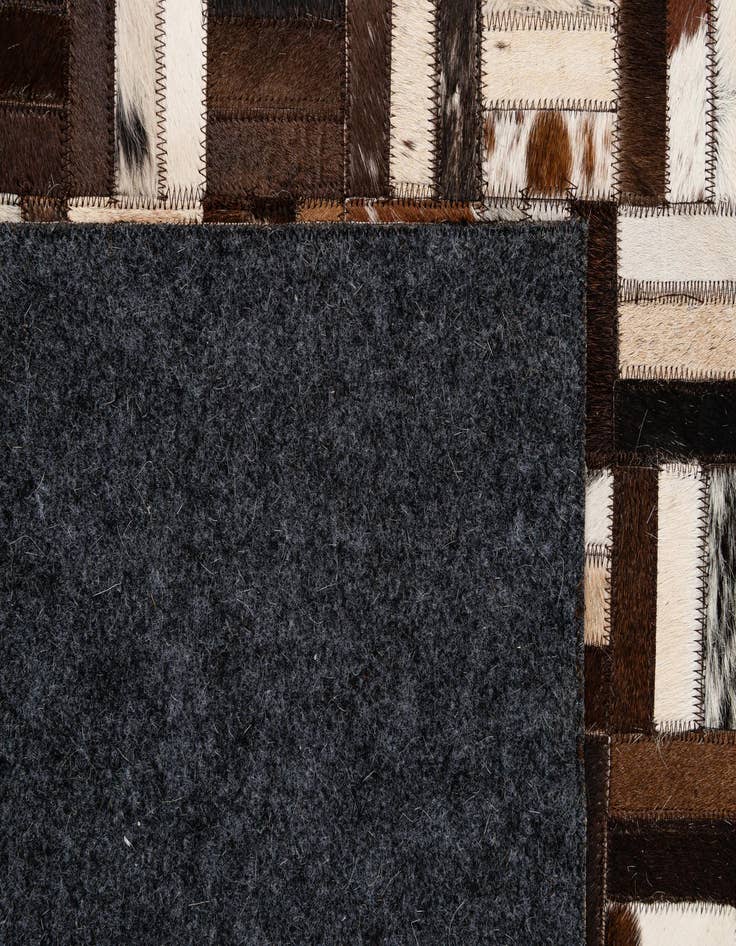Detail image of 4' 11 x 7' 11 Cowhide - Patchwork Rug