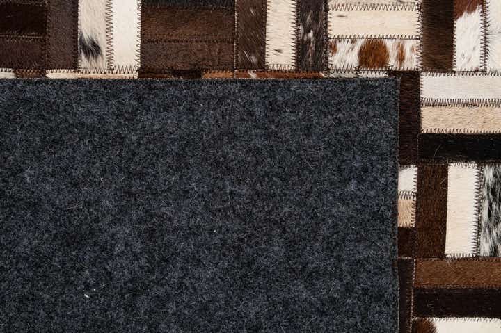 4' 11 x 7' 11 Cowhide - Patchwork Rug