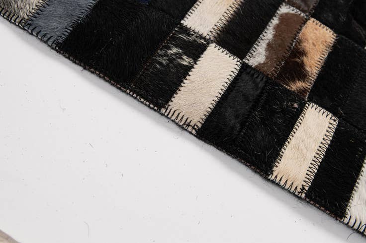 Detail image of 5' 2 x 7' 11 Cowhide - Patchwork Rug