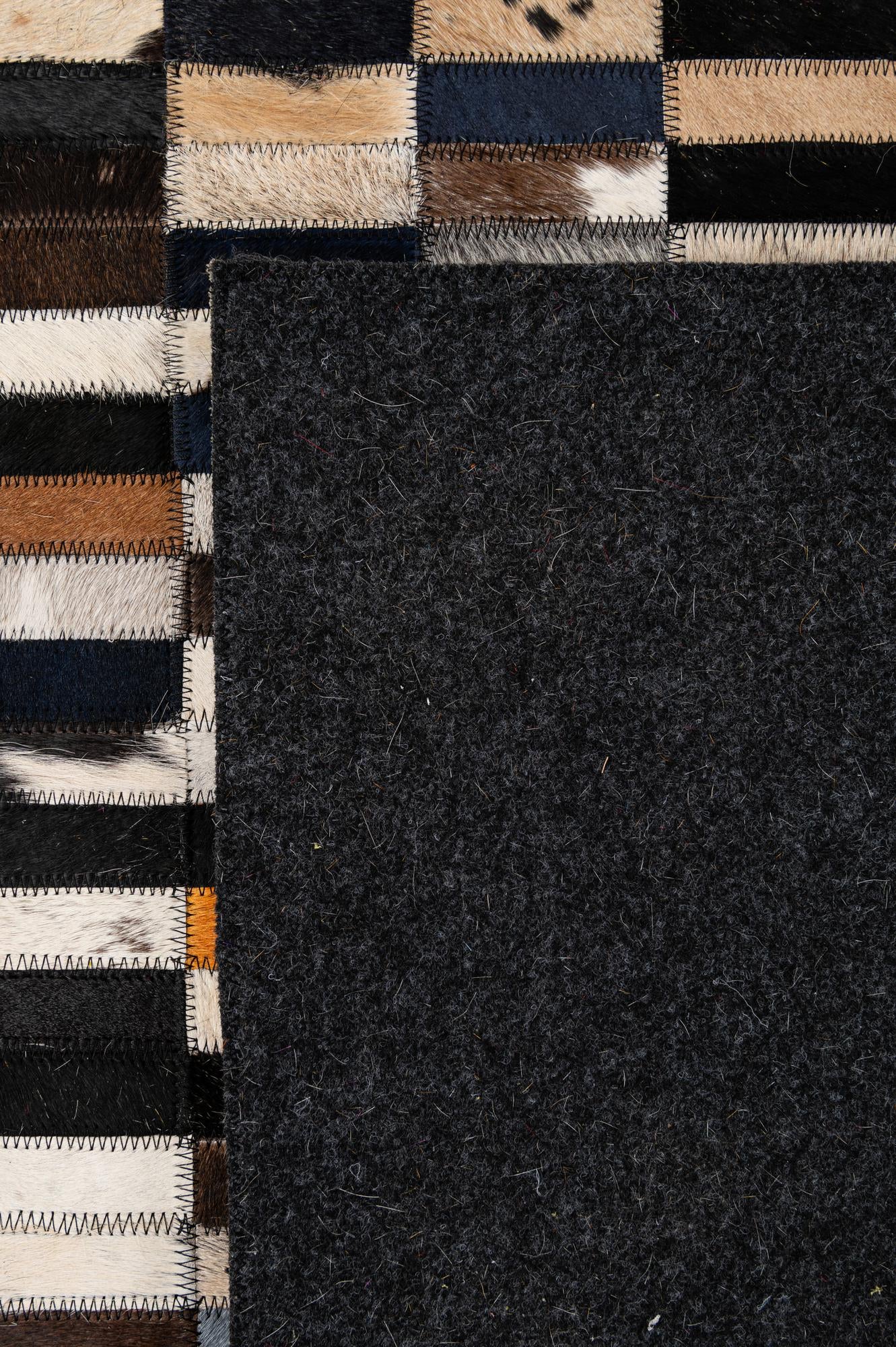 5' 2 x 7' 11 Cowhide - Patchwork Rug