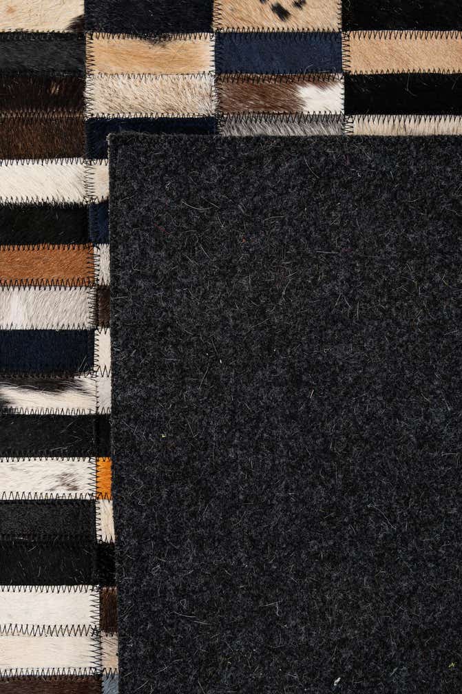 5' 2 x 7' 11 Cowhide - Patchwork Rug