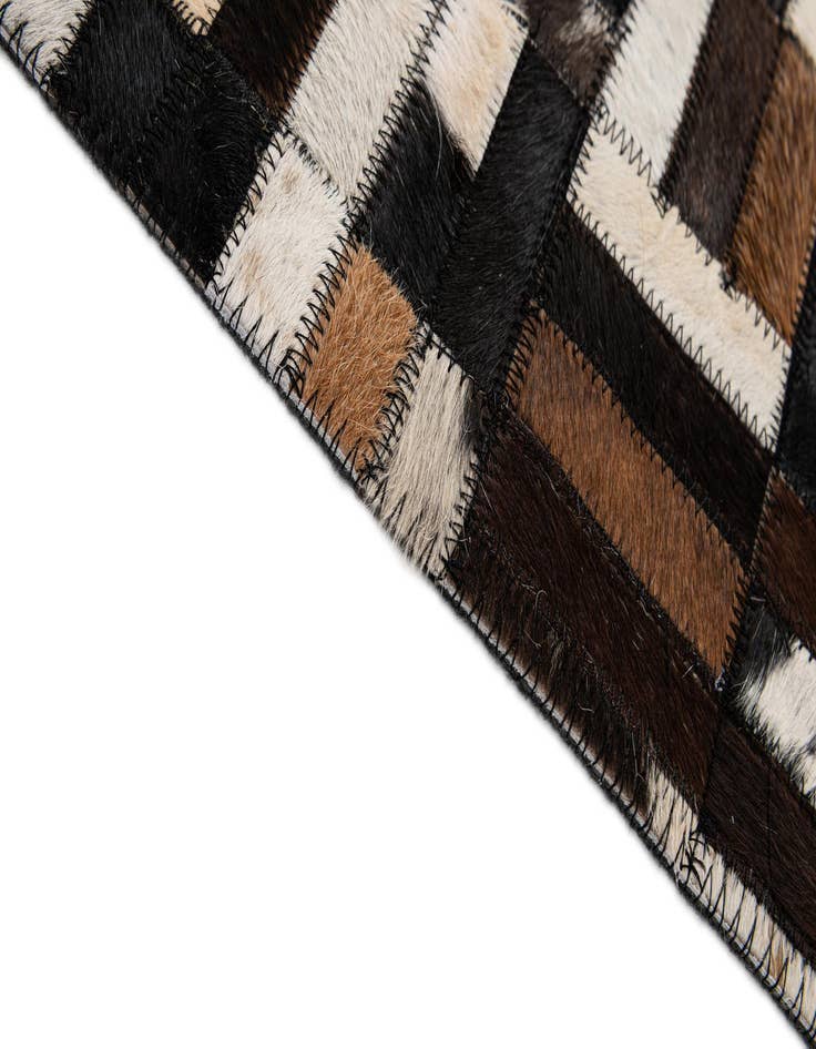 Detail image of 5' 1 x 8' Cowhide - Patchwork Rug