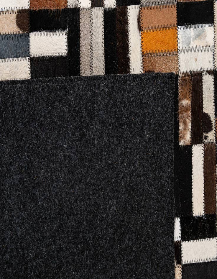Detail image of 5' 1 x 8' Cowhide - Patchwork Rug