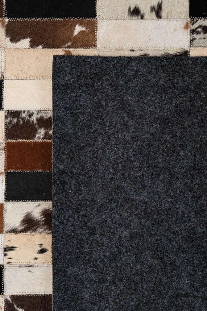 5' 2 x 7' 11 Cowhide - Patchwork Rug