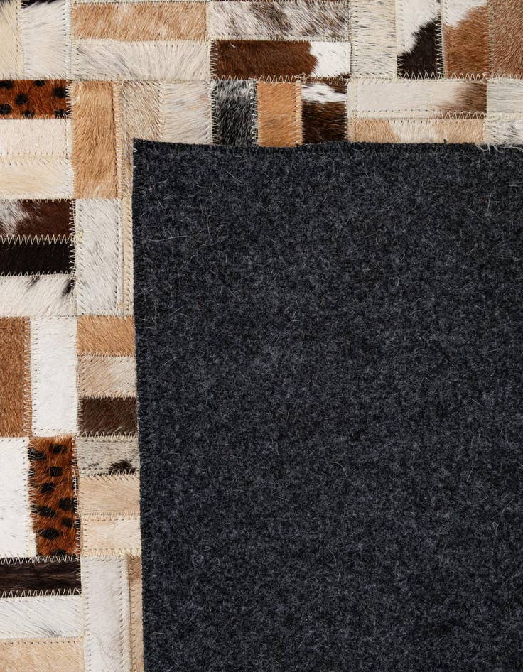 Detail image of 5' 1 x 7' 11 Cowhide - Patchwork Rug