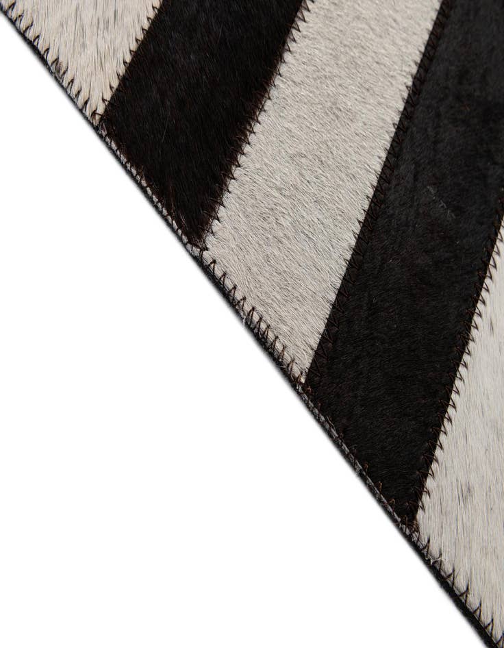 Detail image of 4' 11 x 7' 11 Cowhide - Patchwork Rug