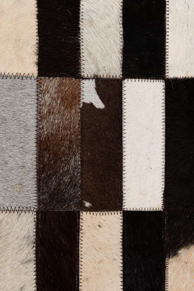 4' 11 x 7' 11 Cowhide - Patchwork Rug