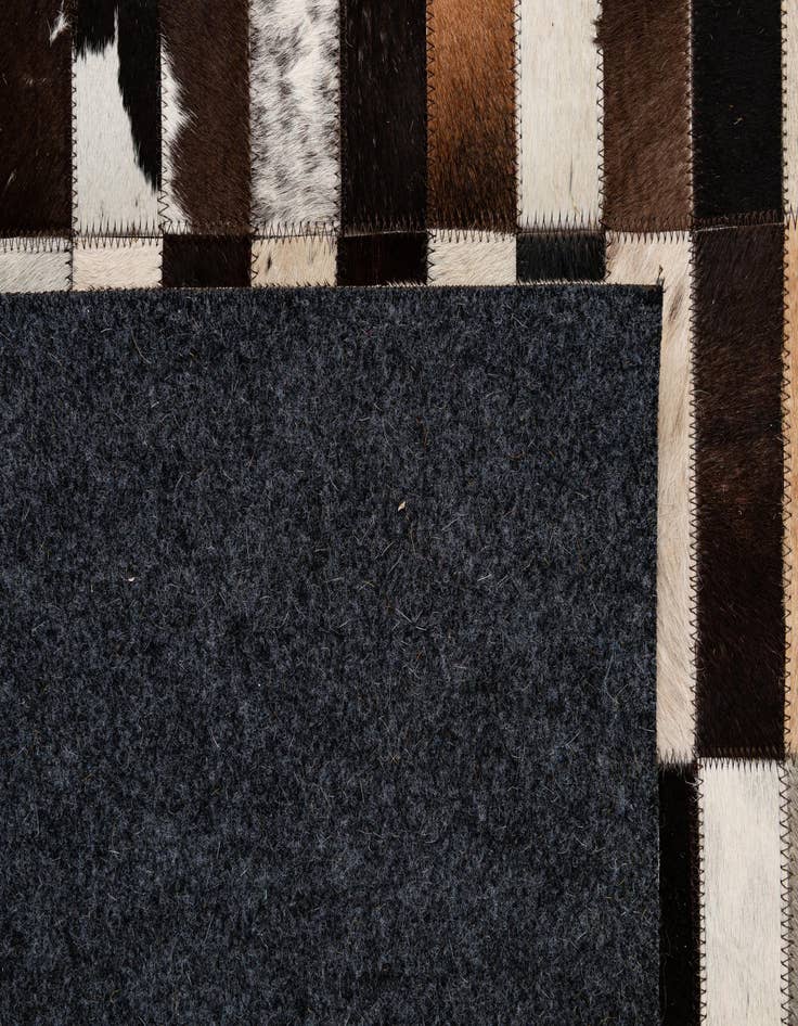 Detail image of 4' 11 x 7' 11 Cowhide - Patchwork Rug