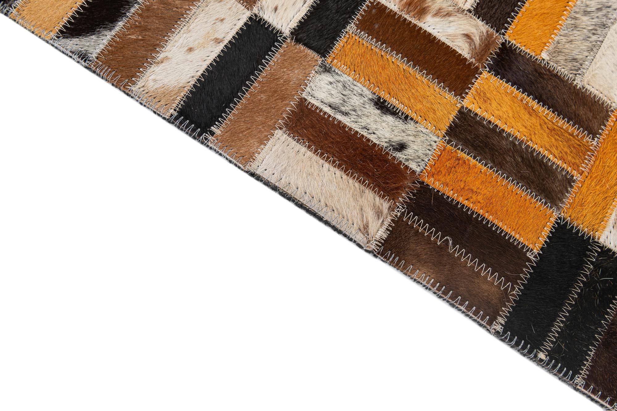 4' 11 x 7' 10 Cowhide - Patchwork Rug