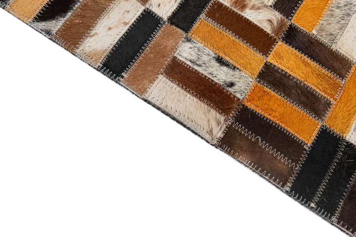 4' 11 x 7' 10 Cowhide - Patchwork Rug